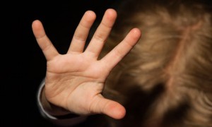 Girl struggling with outstretched hand