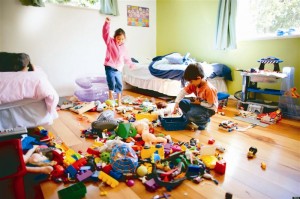 BGK6GA Brother and sister in their bedroom