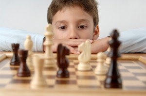 Boy playing the chess
